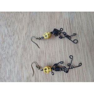 Aretes esqueleto amarillo